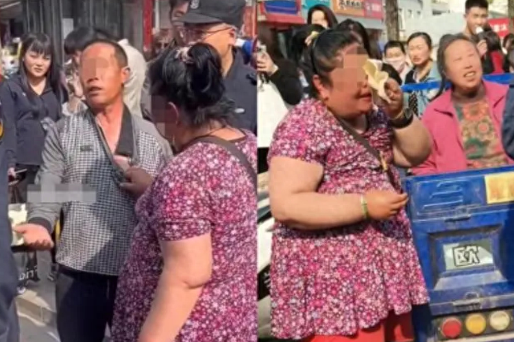 因丈夫不给买金手镯，妻子竟在街上扯其衣领并当众怒吼：就不放开